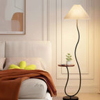 Vintage-style floor lamp ambiance, living room sofa, several high-end bedroom storage racks, standing desk lamp with artistic touch